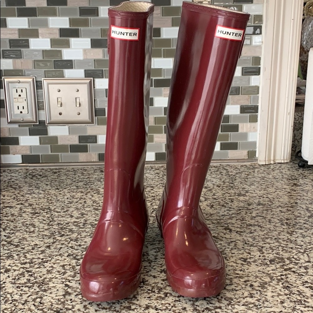 Glossy maroon tall Hunter boots w/ boot socks